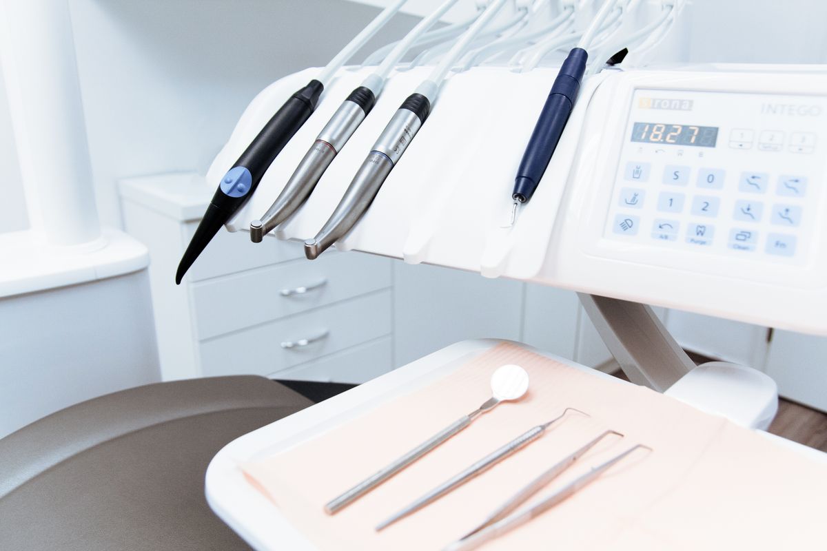 Dental instruments laid out on a clean tray